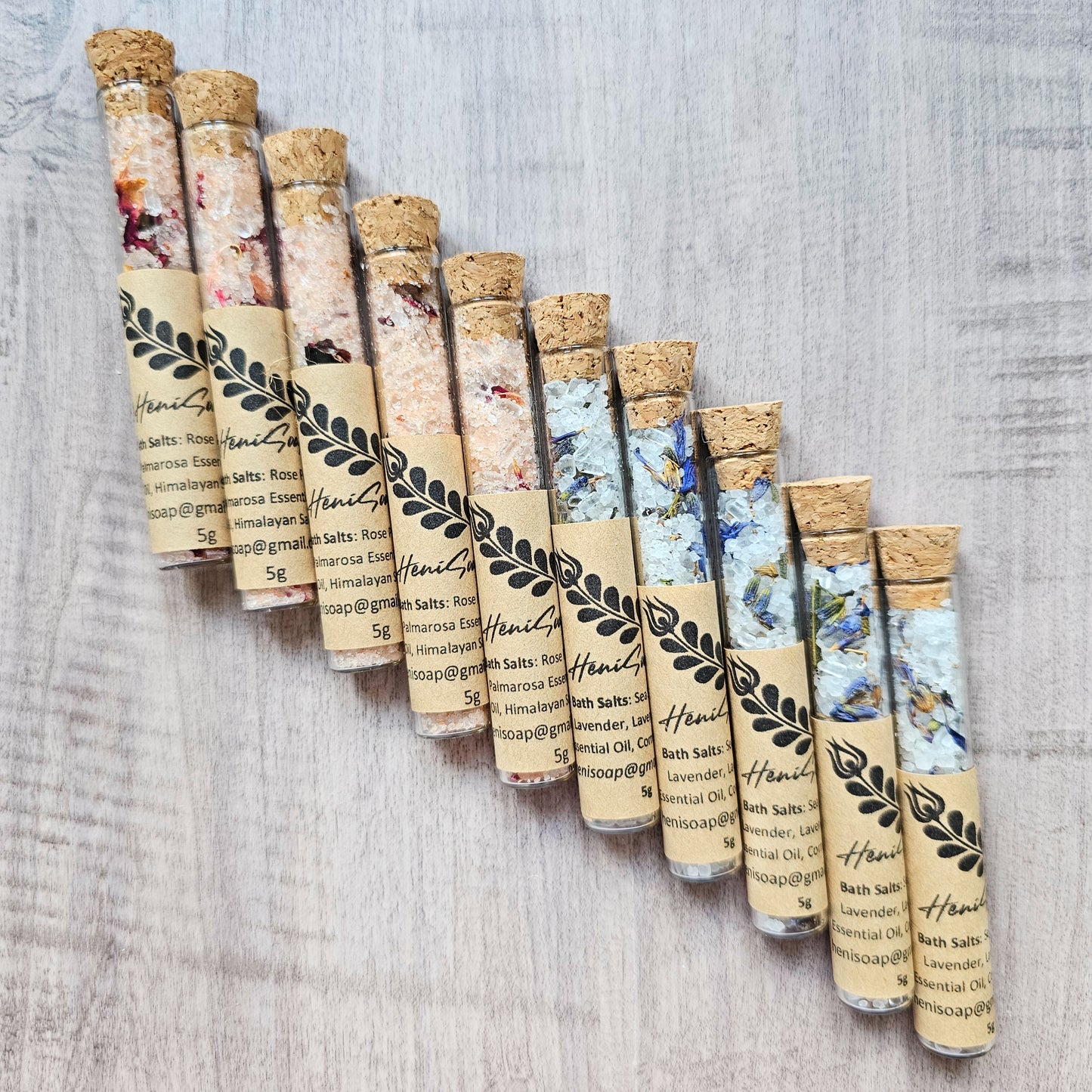 Set of test tubes with cork lids on a textured surface